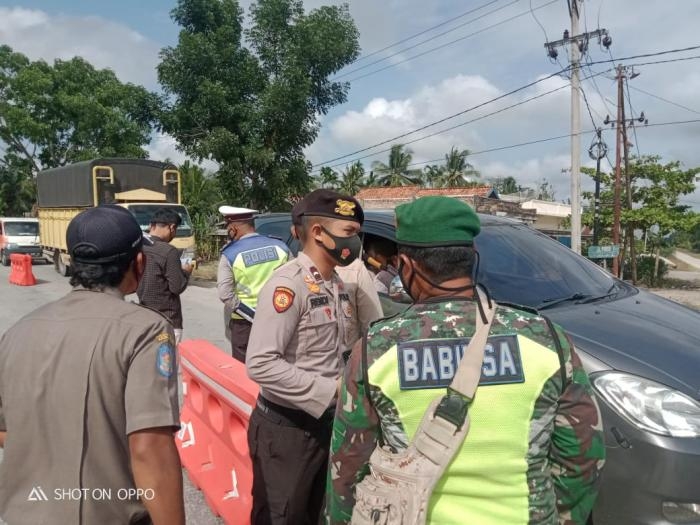 Putus Mata Rantai Covid 19, Personil Koramil 12 Sabak Auh Gelar Operasi Yustisi