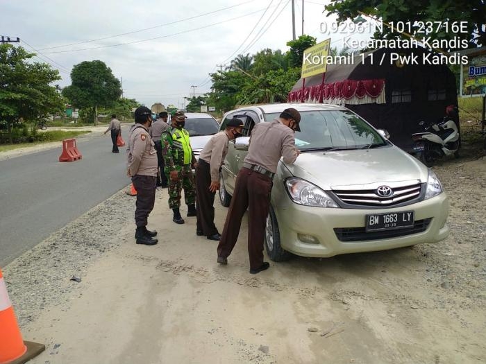 Personil Koramil 11 Kandis Gelar Patroli Prokes Di Posko Penyekatan Mudik