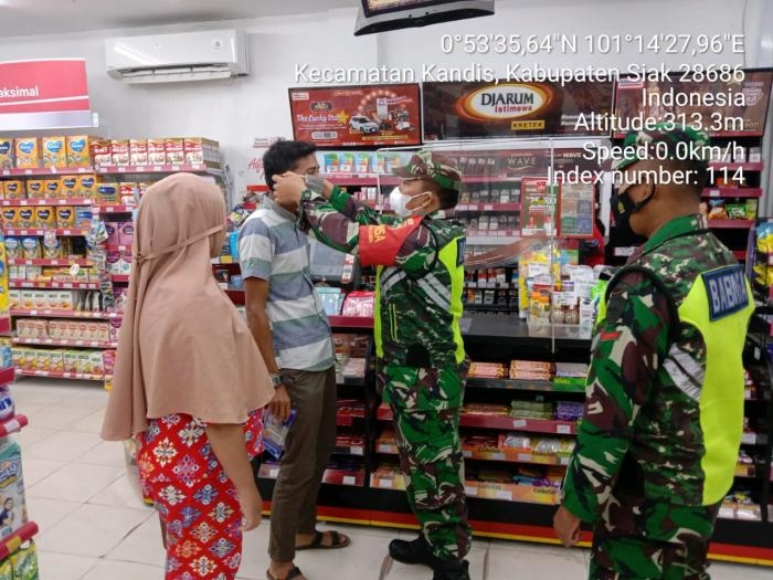 Cegah Covid 19, Anggota Koramil 11 Kandis Gelar Operasi Prokes