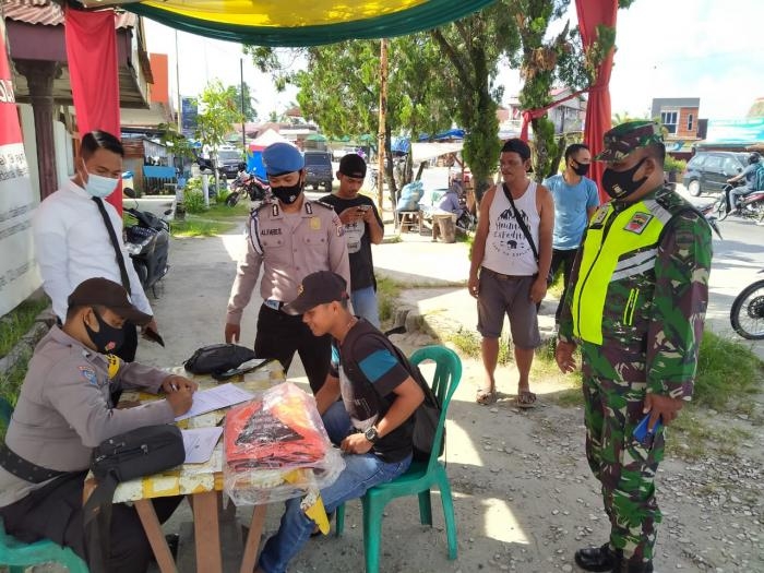 Cegah Covid -19, TNI Gelar Penegakan Disiplin Prokes di Kecamatan Minas