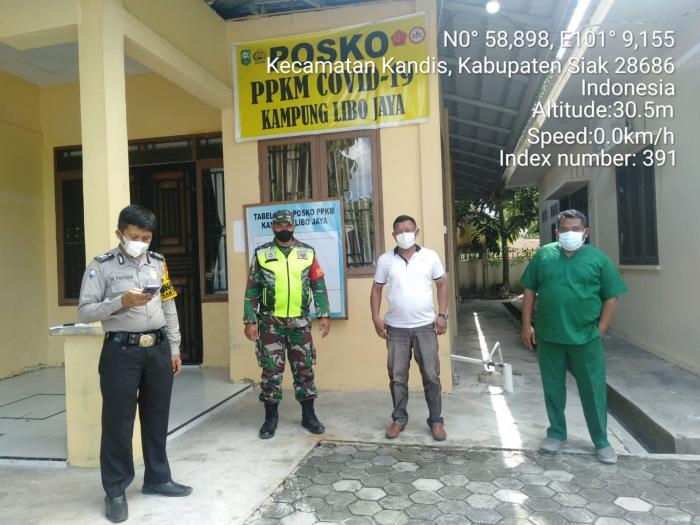 Putus Covid 19, Serda Bosur S Terapkan Aturan Prokes di Posko PPKM Libo Jaya