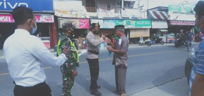 Cegah Penyebaran Covid 19, Anggota Koramil 9 Minas Gelar Operasi Prokes