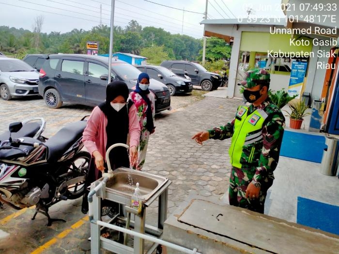 Antisipasi Masalah Covid 19, Personil Koramil 10 Perawang Gelar Patroli Prokes