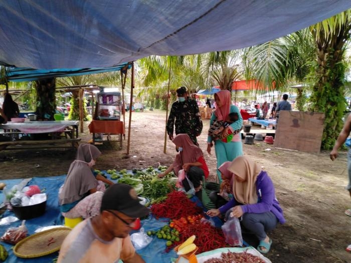 Antisipasi Virus, Serka Risman Girsang Kembali Gelar Operasi Yustisi di Pasar Tradisional