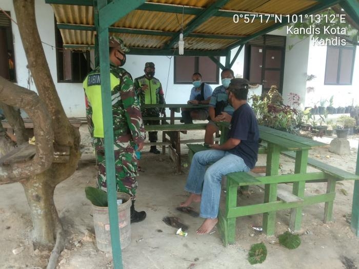 Cegah Covid 19, Serma GN Munthe Terapkan Aturan Prokes di Posko PPKM Kota Kandis