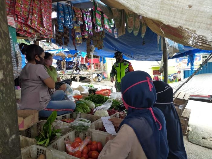 Putus Penularan Covid 19, Personil Koramil 09 Minas Kembali Gelar Operasi Prokes di Pasar Tradisiona