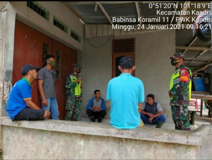 Personil Koramil 11/Pwk Kandis Mengelar Patroli Protokol Kesehatan di Pemukiman Warga