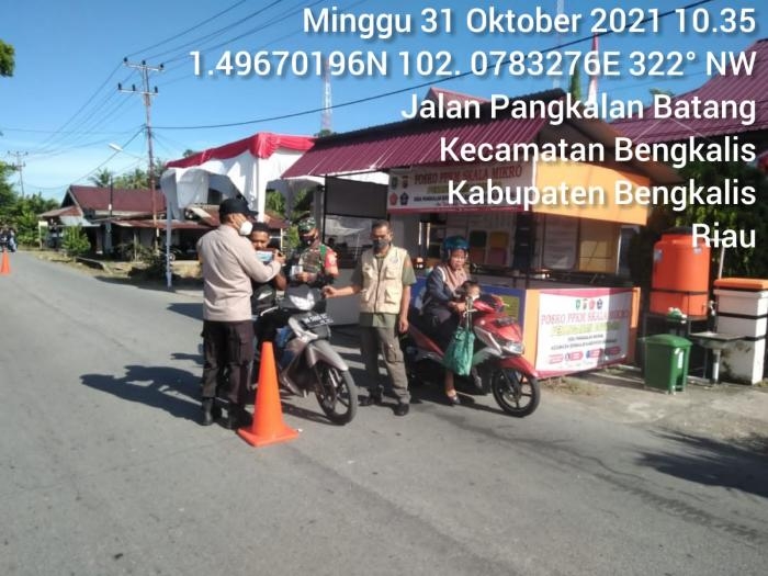 Waspada Virus, Serda RS Sitorus Giat Lakukan Monitoring Prokes di Desa Pangkalan Batang