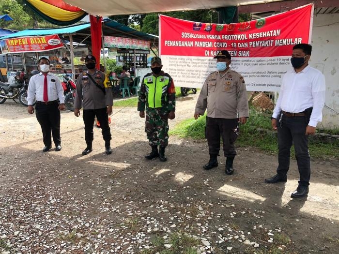 Cegah Covid 19 Personil Koramil 09 Minas Gelar Patroli Prokes