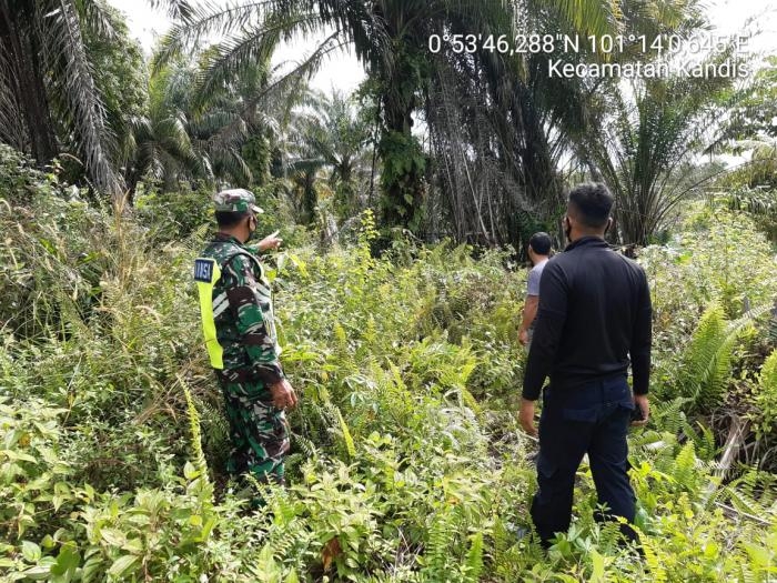Situasi Cuaca Ektrim, Babinsa Kampung Kandis Koptu I Ketut B Giat Lakukan Patroli