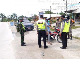 Babinsa Koramil 11/Pwk Kandis gelar patroli gakplin di RM Esember Kandis. 