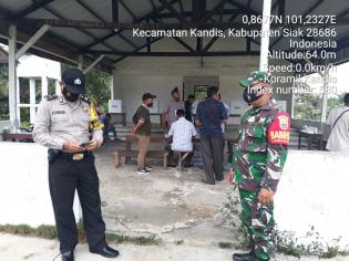 Jaga Pilkamp, Serda D. Gultom Gelar Patroli Bersama Linmas Dan Anggota Polsek Kandis