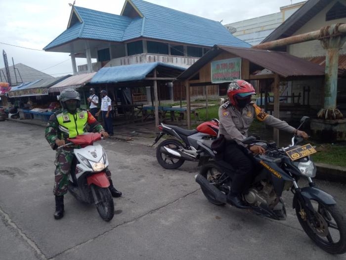 Jelang Pilkada Danramil 08/Merbau Kembali Gelar Patroli Pengamanan.
