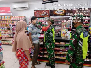Cegah Covid 19, Anggota Koramil 11 Kandis Gelar Operasi Prokes