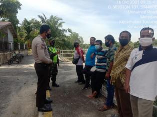 Antisipasi Covid 19, Sertu Uuk Sudarjianto Giat Lakukan Komunikasi Sosial di Kampung Maredan Tualang