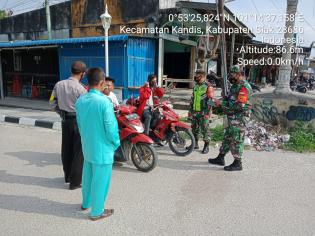 Cegah Covid 19, Serda Julia Darma Kembali Terapkan Aturan Prokes di Kelurahan Telaga Sam Sam 