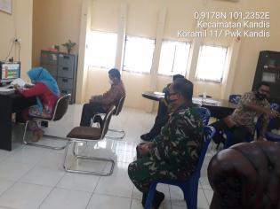 Personil TNI 11 Kandis Gelar Kegiatan Evaluasi Penanganan Covid 19 Bersama Upika