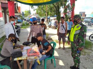 Anggota Danramil 09/Minas Kembali Mengelar Operasi Bantuan Kemanusiaan covid - 19