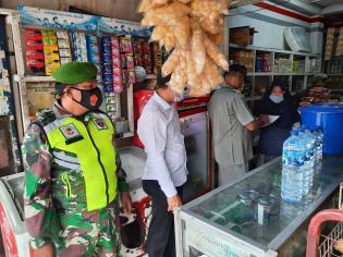 Putus Covid 19, Babinsa Koramil 09 Minas Gelar Prokes di Pasar Tradisional